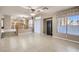 Open concept living area seamlessly connects to the kitchen, creating a great space for entertaining at 7228 Buglehorn St, Las Vegas, NV 89131