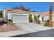 Lovely single-story home with a well-maintained front yard and a spacious two-car garage at 7772 Buckwood Ct, Las Vegas, NV 89149