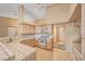 Bright kitchen features tile countertops, ample cabinet space, and gas range at 7772 Buckwood Ct, Las Vegas, NV 89149