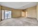 Large living room with sliding door access to outdoor living space at 7772 Buckwood Ct, Las Vegas, NV 89149