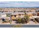 Overhead view of a neighborhood showcasing modern homes, manicured yards, and community design at 80 Pristine Glen St, Las Vegas, NV 89135
