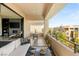 Inviting balcony featuring comfortable seating, stylish decor, and seamless indoor-outdoor living at 80 Pristine Glen St, Las Vegas, NV 89135