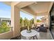 Cozy balcony setup with modern furniture, offering a relaxing outdoor living space at 80 Pristine Glen St, Las Vegas, NV 89135