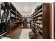 This expansive walk-in closet features custom shelving and drawers to maximize storage at 80 Pristine Glen St, Las Vegas, NV 89135