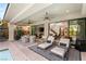 Outdoor living space featuring a patio, pool, lounge chairs, and an open floor plan at 80 Pristine Glen St, Las Vegas, NV 89135