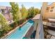 A view from the balcony overlooking a private pool and relaxing outdoor lounge area at 80 Pristine Glen St, Las Vegas, NV 89135