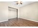 Bedroom with hardwood floors, ceiling fan and a closet at 8224 Crystal Star Ct, Las Vegas, NV 89145