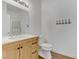 Bathroom featuring a wood vanity with marble countertops and a glass shower at 8408 Running Deer Ave # 103, Las Vegas, NV 89145