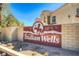 Indian Wells community sign featuring a decorative design at 8408 Running Deer Ave # 103, Las Vegas, NV 89145