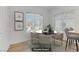 Staged dining room with modern decor and natural light at 8408 Running Deer Ave # 103, Las Vegas, NV 89145