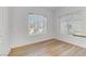 Sunlit dining area with updated flooring and bright windows at 8408 Running Deer Ave # 103, Las Vegas, NV 89145