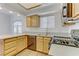 Modern kitchen with stainless steel appliances, updated countertops, and plenty of cabinet space at 8408 Running Deer Ave # 103, Las Vegas, NV 89145