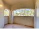 Charming covered patio with beautiful views and tile flooring at 8408 Running Deer Ave # 103, Las Vegas, NV 89145