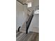 Bright entryway showcasing the staircase with dark wood trim and decorative lighting at 9008 Cotton Rose Way, Las Vegas, NV 89134