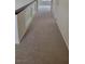 Upstairs hallway with carpet flooring and access to bedrooms or bathrooms at 9008 Cotton Rose Way, Las Vegas, NV 89134