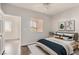 Comfortable bedroom with natural light, neutral colors, and calm décor at 9580 W Reno Ave # 211, Las Vegas, NV 89148