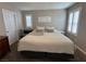 Bright bedroom with natural light and a comfortable bed and shutters at 961 Spiracle Ave, Henderson, NV 89002