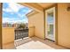 Second story balcony with stucco walls and views of the surrounding community at 11298 Merado Peak Dr, Las Vegas, NV 89135
