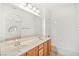 Bright bathroom featuring double sinks with a shower and bath combo at 11298 Merado Peak Dr, Las Vegas, NV 89135