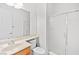 Bathroom featuring a tile floor, vanity, toilet, and glass enclosed shower at 11298 Merado Peak Dr, Las Vegas, NV 89135