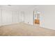 Neutral toned bedroom with carpeted floors and walk-in closet at 11298 Merado Peak Dr, Las Vegas, NV 89135