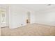 Neutral-toned bedroom with carpeted floors and bathroom access at 11298 Merado Peak Dr, Las Vegas, NV 89135