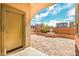 View of fountain and beautiful landscaped patio in a luxury community at 11298 Merado Peak Dr, Las Vegas, NV 89135