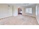 Cozy living room featuring neutral carpet and updated decor for a welcoming ambiance at 1140 Paradise Vista Dr, Henderson, NV 89002