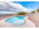 Inground pool and spa with desert landscaping and plenty of room for relaxation at 1516 Dusty Canyon St, Henderson, NV 89052