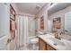 Bathroom featuring vanity, shower with tub, and modern decor at 1516 Dusty Canyon St, Henderson, NV 89052