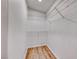 Walk-in closet with wire shelving and wood-look flooring at 1516 Dusty Canyon St, Henderson, NV 89052
