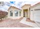 Charming single-story home showcasing a well-maintained front yard and inviting entrance at 1516 Dusty Canyon St, Henderson, NV 89052