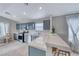 Inviting kitchen with a breakfast bar and blue cabinets, perfect for casual dining at 1516 Dusty Canyon St, Henderson, NV 89052