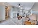Spacious living room with fireplace, ceiling fan, and comfortable seating arrangement at 1516 Dusty Canyon St, Henderson, NV 89052