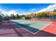 Community tennis courts with well-maintained surface and nets, offering a recreational amenity at 1516 Dusty Canyon St, Henderson, NV 89052