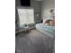 Neutral bedroom features carpet floors, a window, and a daybed with soft pink decorative pillows at 170 Magnolia Blvd, Pahrump, NV 89048