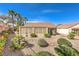 Exterior view of the home with desert landscaping and enclosed patio at 1821 Eagle Mesa Ave, Henderson, NV 89012