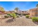 Low maintenance backyard with small plants and view of patios at 1821 Eagle Mesa Ave, Henderson, NV 89012