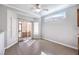 Bright breakfast nook with large windows, hardwood flooring and a glass sliding door at 1821 Eagle Mesa Ave, Henderson, NV 89012
