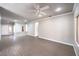 Expansive living area featuring hardwood floors, neutral color walls, and great lighting at 1821 Eagle Mesa Ave, Henderson, NV 89012