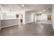 Open-concept living space with hardwood floors flowing into the kitchen area at 1821 Eagle Mesa Ave, Henderson, NV 89012