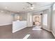 A spacious living area with hardwood floors and glass sliding doors to the patio at 1821 Eagle Mesa Ave, Henderson, NV 89012