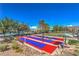 Community shuffleboard courts with shade and seating areas at 1821 Eagle Mesa Ave, Henderson, NV 89012