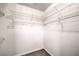 This walk-in closet features wood-look flooring and white wire shelving for ample storage at 1821 Eagle Mesa Ave, Henderson, NV 89012