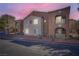 Exterior view of multi-Gathering property with muted color scheme and architectural details at 2110 Sealion Dr # 101, Las Vegas, NV 89128