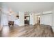 Spacious living room showcases hard surface flooring, a ceiling fan and open floorplan at 2110 Sealion Dr # 101, Las Vegas, NV 89128