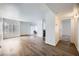 Open living area with light-filled window and hard surface flooring at 2110 Sealion Dr # 101, Las Vegas, NV 89128