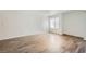 Inviting living room features hard surface floors and ample natural light at 2110 Sealion Dr # 101, Las Vegas, NV 89128