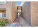 Exterior walkway shows access to units and building design at 2110 Sealion Dr # 101, Las Vegas, NV 89128