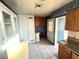 Kitchen including tile flooring and a built in white hutch at 2208 E Ogden Ave, Las Vegas, NV 89101